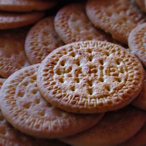 High-resolution photo of tasty Marie biscuits stacked closely.
