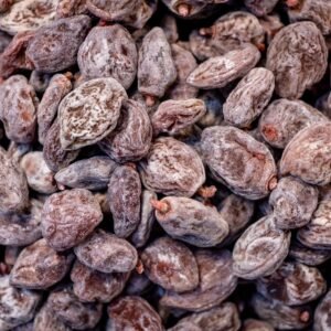 A compelling close-up of dried persimmons showcasing their texture, perfect for culinary themes.